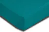 A close-up view of a teal-colored fitted sheet, showing the texture and corner. Produktbild-Vorschau