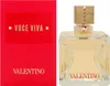 A red box and a perfume bottle are shown side-by-side against a white background. Voir les images du produit