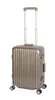 A gold-colored carry-on suitcase with a retractable handle and four wheels, isolated on a white background. Podgląd zdjęcia produktu