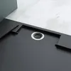 A close-up view of a black shower tray with a silver drain. Produktbild-Vorschau