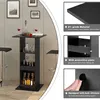 A black bar table with shelves, set against a textured gray wall, with two bar stools. Produktbild-Vorschau