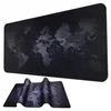 A large black mouse and keyboard pad with a world map design is shown, with a smaller, folded version of the pad below it. Náhled obrázku produktu