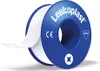 A roll of medical tape on a white background. Voir les images du produit