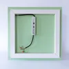 The back of a rectangular mirror with LED lighting components attached. Produktbild-Vorschau