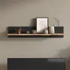A shelf mounted on a wall with decorative items. Produktbild-Vorschau