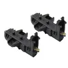 Two black plastic electrical components with gold metal contacts, isolated on a white background. Produktbild-Vorschau