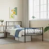 A bedroom scene with a metal bed frame. Podgląd zdjęcia produktu
