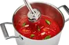 An immersion blender is being used to blend a tomato sauce in a pot. Produktbild-Vorschau