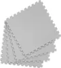 A stack of interlocking foam puzzle mats. Produktbild-Vorschau
