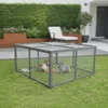 Two rabbits in an outdoor enclosure on grass. Anteprima dell’immagine prodotto