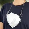 A person wearing a dark blue t-shirt is shown with a white face mask hanging from a silver chain around their neck. Produktbild-Vorschau