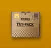 A cardboard box with product branding and information, set against an orange background. Produktbild-Vorschau
