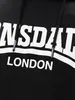 A close-up shot of a black hoodie with white text. Produktbild-Vorschau