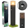 A collage of images showing a black post lamp with a motion sensor, its packaging, and a close-up of the bulb. Náhľad obrázku produktu