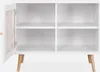 A white sideboard with a cane door and wooden legs, shown with the door open. Anteprima dell’immagine prodotto