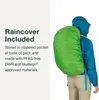A person wearing a blue jacket and tan pants is shown from the back, wearing a large green backpack covered by a rain cover. Produktbild-Vorschau