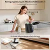 A woman is adding cleaning solution to a steam cleaner in a kitchen, with a second image showing the steam cleaner in use. Anteprima dell’immagine prodotto