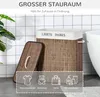 A laundry basket with a lid is shown in a bathroom setting, with icons indicating its uses. Produktbild-Vorschau