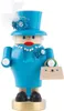 A wooden nutcracker shaped like Queen Elizabeth II, dressed in a blue outfit and hat, holding a handbag. Produktbild-Vorschau