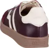 A close-up, side view of a burgundy and cream sneaker. Produktbild-Vorschau