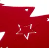 A close-up of a red felt Christmas tree decoration with cut-out stars. Podgląd zdjęcia produktu