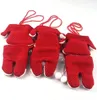 Three red knitted Christmas-themed cutlery holders shaped like Santa's suit are arranged on a white background. Produktbild-Vorschau