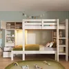 A child's bedroom with a bunk bed, shelves, and drawers. Anteprima dell’immagine prodotto