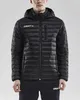 A man wearing a black puffer jacket and black pants. Anteprima dell’immagine prodotto