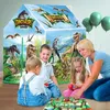 A family playing with a dinosaur-themed play tent. Podgląd zdjęcia produktu