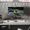A gaming setup with a monitor displaying a racing game, a keyboard, a mouse, and a game controller. Produktbild-Vorschau