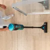 A person is using a cordless vacuum cleaner on a wooden floor next to a shower enclosure. Produktbild-Vorschau