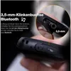 Close-up of a rugged phone's ports, with text highlighting its 3.5mm headphone jack and Bluetooth connectivity. Podgląd zdjęcia produktu