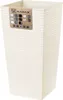A tall, cream-colored planter with a textured surface and a label on the front. Náhled obrázku produktu