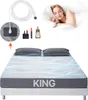 A collage showing a king-size grounding sheet, accessories, and a woman sleeping peacefully. Anteprima dell’immagine prodotto