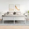 A bedroom scene with a white bed and two white nightstands. Anteprima dell’immagine prodotto
