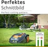 A robotic lawn mower is shown on a green lawn in a backyard setting, with a person relaxing on a lounge chair in the background. Produktbild-Vorschau