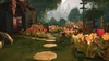A vibrant garden path leading to a quaint house, with flowers in full bloom. Anteprima dell’immagine prodotto