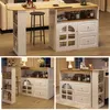 A multi-panel image showcasing a white and wood-toned bar table with storage, including a sideboard with a glass-door cabinet and drawers, and a tall shelf unit. The table is shown in different angles and settings, suggesting its functionality and design. Anteprima dell’immagine prodotto
