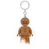A gingerbread man LEGO keychain with a light in its foot. Produktbild-Vorschau