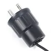 A close-up view of a black electrical plug with silver prongs. Podgląd zdjęcia produktu