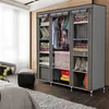 A portable fabric wardrobe filled with clothes and linens. Voir les images du produit