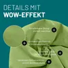 A close-up of a green fabric with text overlays highlighting product features. Voir les images du produit