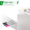 A stack of white paper with a few sheets fanned out showing a color chart, and a graphic indicating high yield ink cartridges. Produktbild-Vorschau