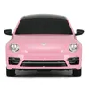 Front view of a pink Volkswagen Beetle toy car against a white background. Náhled obrázku produktu
