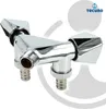 A chrome-plated brass double device valve with two outlets and a wall rosette, presented on a white and gray background with a subtle graphic overlay. Produktbild-Vorschau