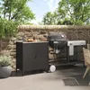 An outdoor patio setting with a grill and storage cabinet. Produktbild-Vorschau