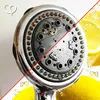 A split image showing a dirty shower head on one side and lemons and water on the other, suggesting a cleaning product. Produktbild-Vorschau