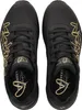 A top-down view of a pair of black Skechers Uno women's sneakers with gold floral detailing. Voir les images du produit