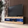 A modern living room setup featuring a TV stand with a television and soundbar. Náhled obrázku produktu