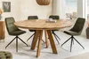 A round wooden dining table with four green chairs in a well-lit room. Produktbild-Vorschau